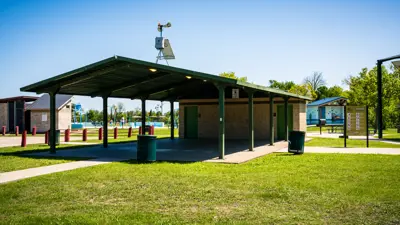 covered pavilion with bathrooms at a park
