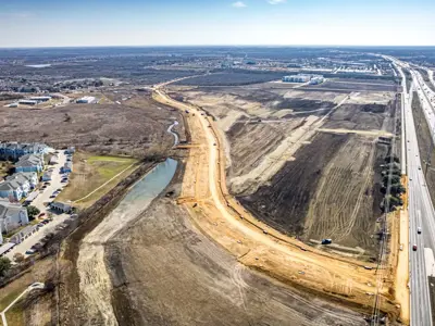 A drone shot of a road being constructed east of I-35 in Kyle. The road is the Kohlers Crossing extension. 